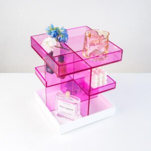rotating acrylic makeup organizer on desktop