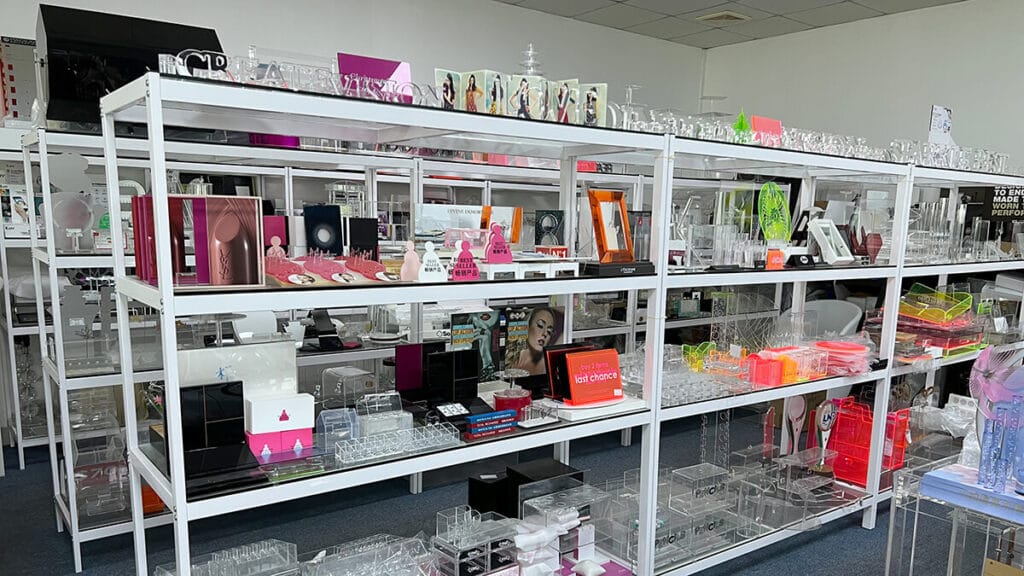Clear acrylic display boxes, retail stands, and custom product cases