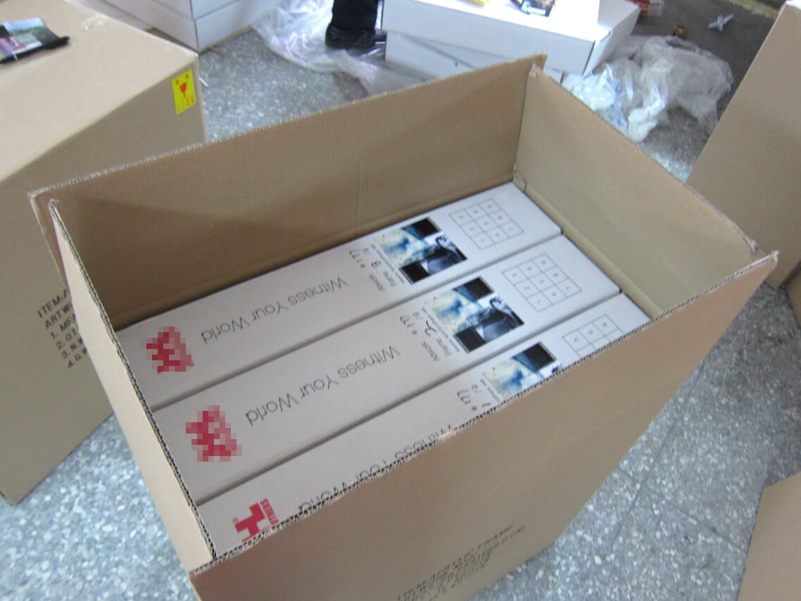 acrylic shadow box frames packed in white boxes and master cartons