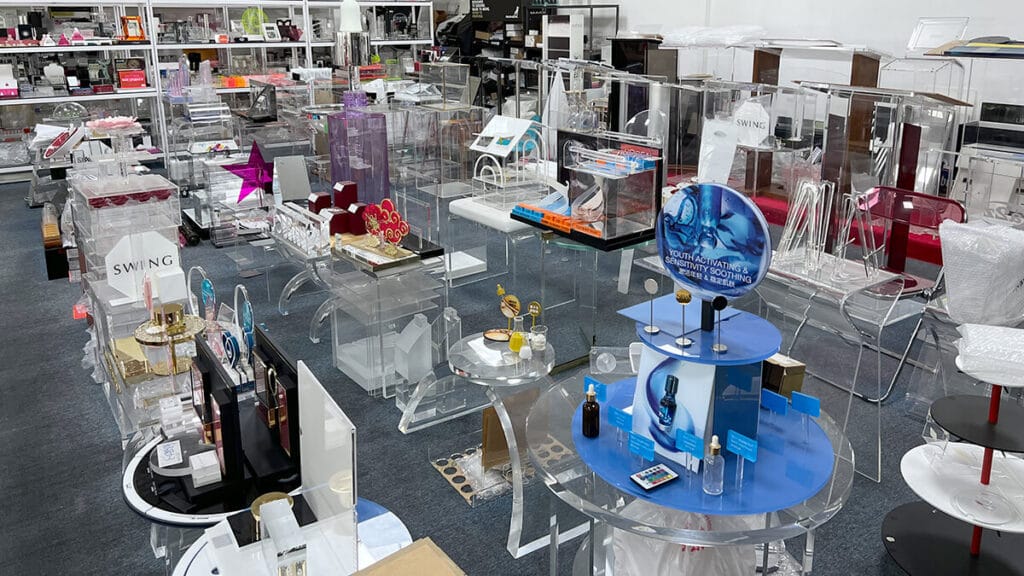 Custom acrylic podiums, lecterns, and transparent furniture in showroom