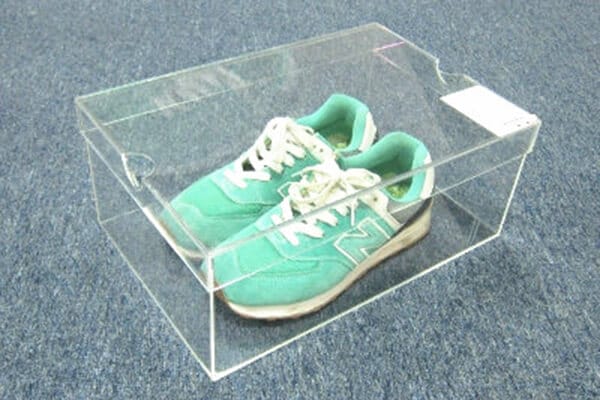 New Balance sneaker stored in custom clear acrylic shoe box — small batch OEM order for sneaker collector personal display case
