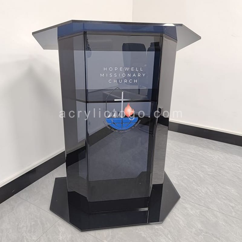 Smoke black acrylic church lectern with custom UV-printed logo and metal base feet