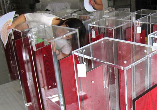 Inspection of acrylic surface quality and polished edges at ACRYLIC2GO factory