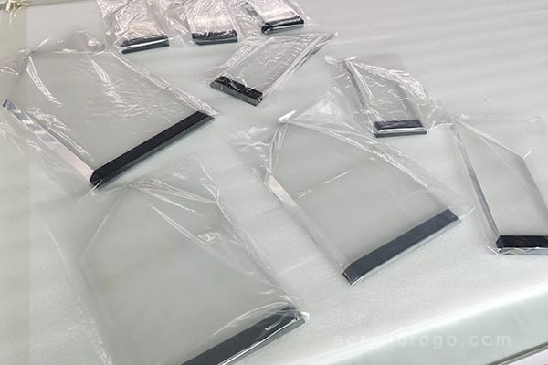 Finished acrylic trophy and award pieces individually wrapped in protective poly bags