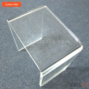 Custom acrylic lucite waterfall side table with seamless curved edge, overhead angle view — OEM wholesale factory ACRYLIC2GO