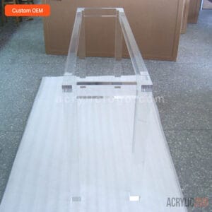 End view of custom clear acrylic lucite console table frame showing leg and rail joint construction — ACRYLIC2GO OEM factory Shenzhen