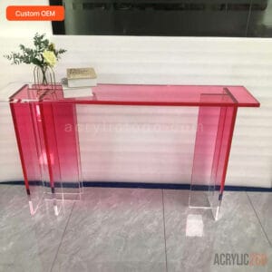 Front view of custom translucent pink acrylic console table with ombre tabletop for entryway or living room use