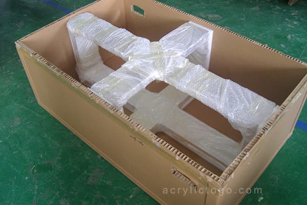 Acrylic furniture packed inside a honeycomb crate with bubble wrap and PE foam protective padding