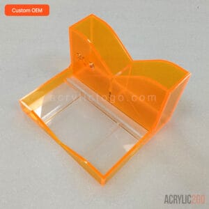 Close-up of bonded seam joint on a neon orange acrylic desk organizer