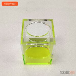 Front view of acrylic desk tidy showing overlapping circular window cutouts on adjacent faces