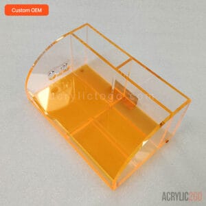 Angled view of acrylic jewelry organizer showing the curved corner and interior compartments
