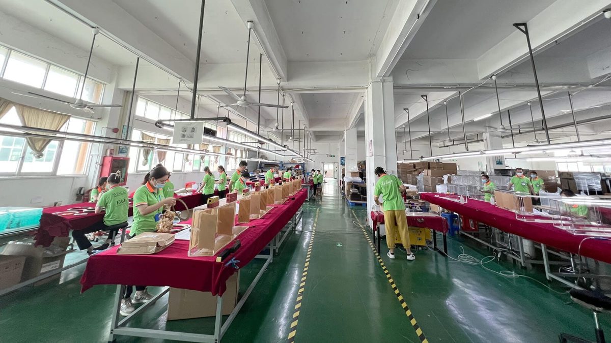 Modern acrylic manufacturing plant with CNC precision machining and assembly lines
