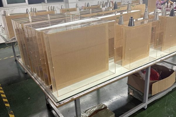 custom acrylic shadow box frames in factory production