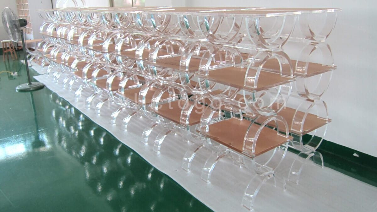 Batch production of custom acrylic furniture at ACRYLIC2GO manufacturing facility.